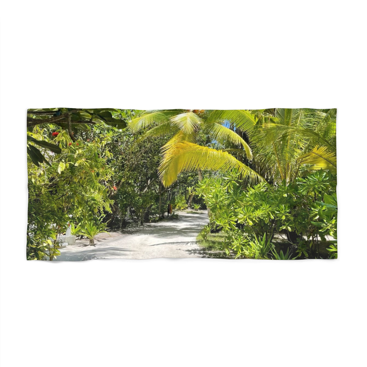Jungle Trail Palms beach towel laid flat: sunlit palm fronds and tropical greenery along a sandy trail