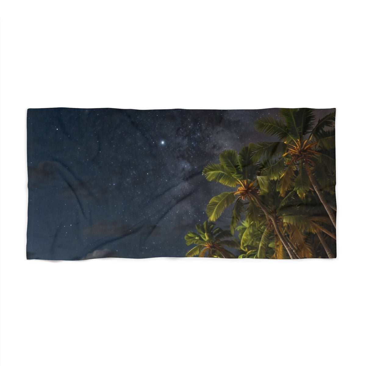 Starlit Palms beach towel laid flat, showing palm fronds against a starry night sky