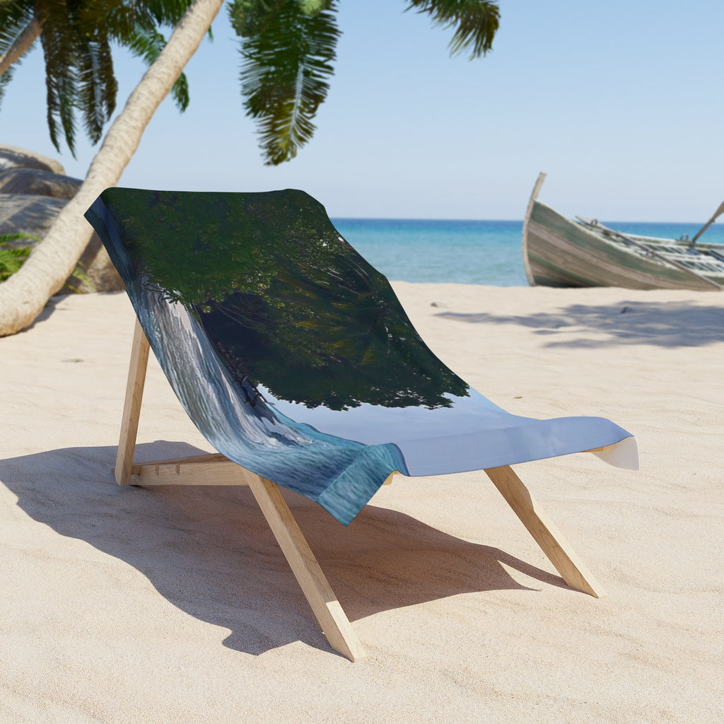 Shady Shoreline beach towel draped over a wooden beach chair on the sand (chair not included)