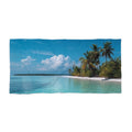 Calm Island Shore beach towel laid flat: palm trees and a white-sand shore beside calm water under a cloudy blue sky