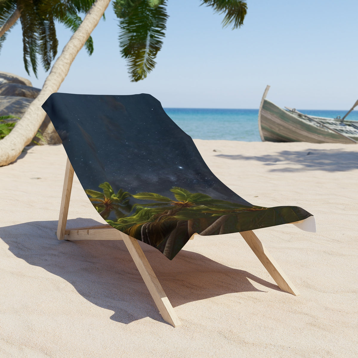 Starlit Palms beach towel draped over a wooden beach chair on the sand; chair and scenery not included