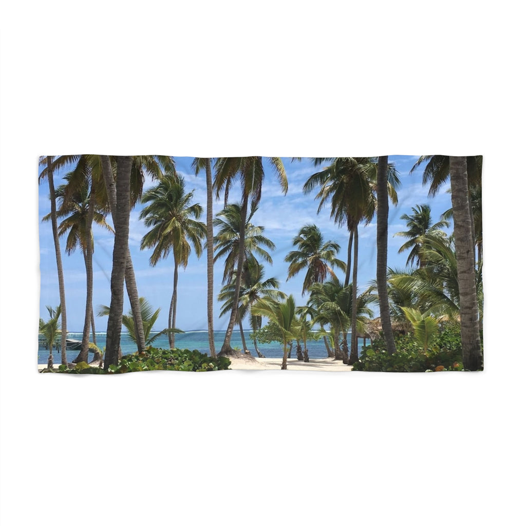Palm Grove Shoreline beach towel laid flat, showing rows of tall palms framing a glimpse of blue sea