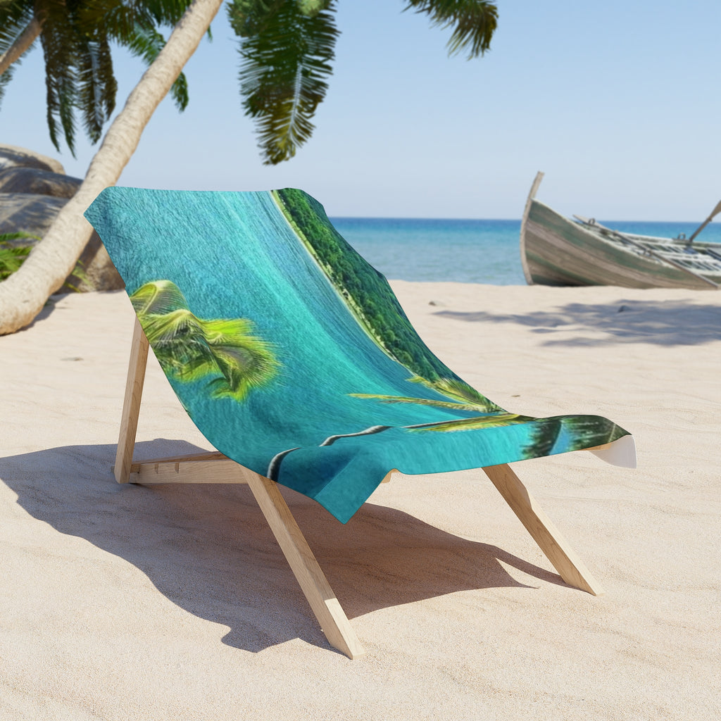 Turquoise Bay Palms beach towel draped over a wooden beach chair on the sand (chair not included)
