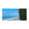 Sunny Cove beach towel laid flat: white-sand beach, turquoise water and blue sky beside leafy green trees