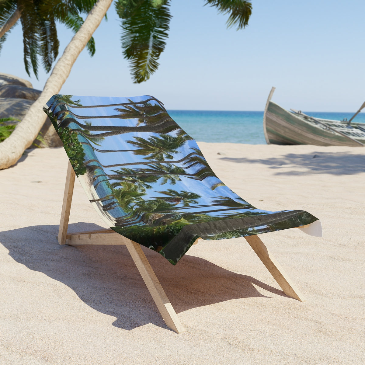 Palm Grove Shoreline beach towel draped over a wooden beach chair on the sand; chair and scenery not included